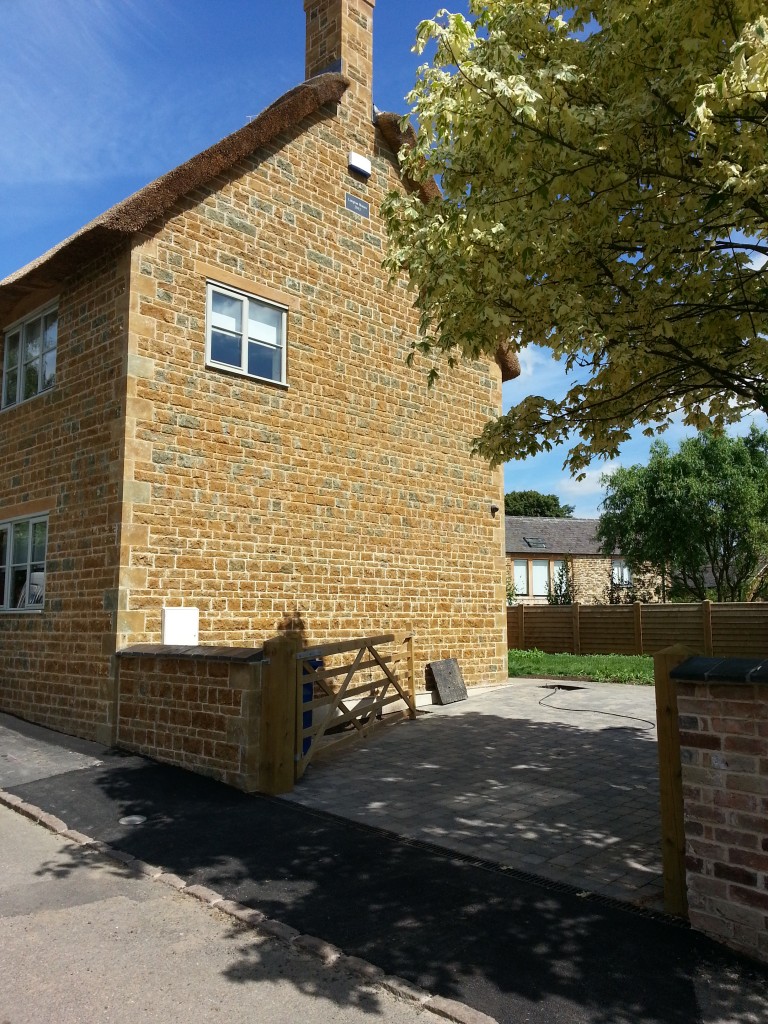 House built next to busy road with piled foundations