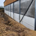 Bentonite waterproofing sheets built up in layers, weather lapped